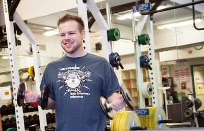 Clark student Billy Henry pumps iron