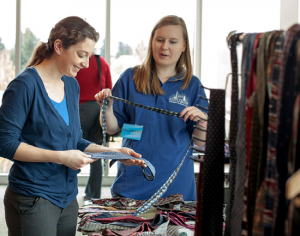 Clark staff members help sort ties during the 2013 Career Clothing Closet, an annual event that provides Clark students with free professional attire.