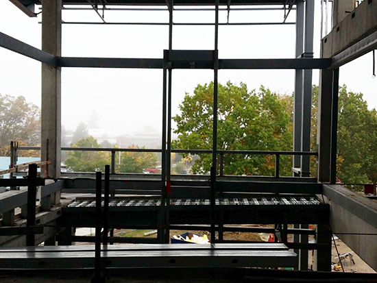 Fourth floor conference room with a view to the main campus through the supper lobby. The drop town framework is in the center of this October 1, 2015, photo.