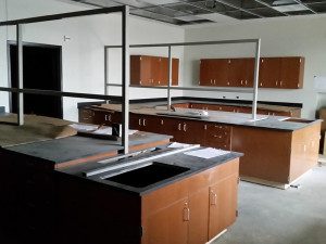 Installation of the chemistry counter-tops and storage.