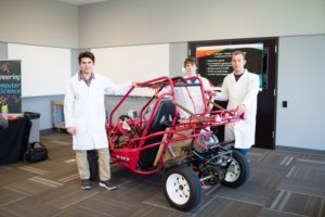 Students show off their project during an exclusive STEM tour and reception on June 6, 2016.