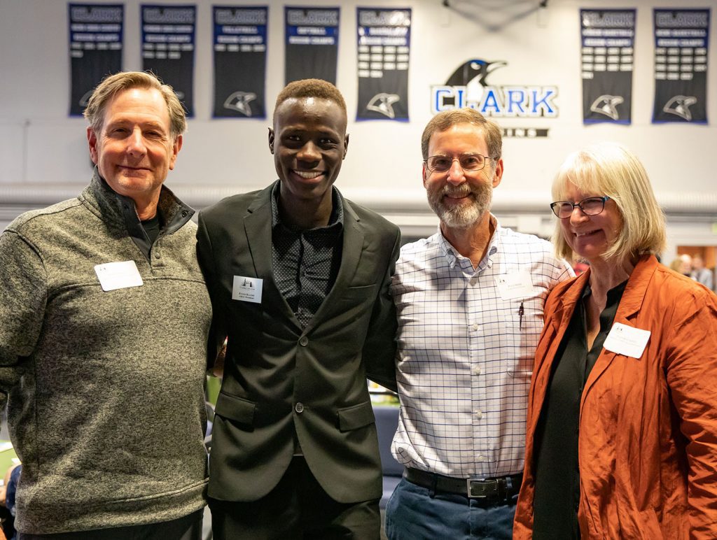 Eric Merrill, Evans Kaame, Paul Speer and Jeanne Caswell at a 2019 scholarship reception.