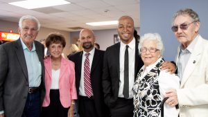 Al Bauer, an unknown guest, Ara Serjoie, Army veteran and speaker, J.R. Martinez, and Mrs. and Mr. Leech at Clark's 2012 commencement.