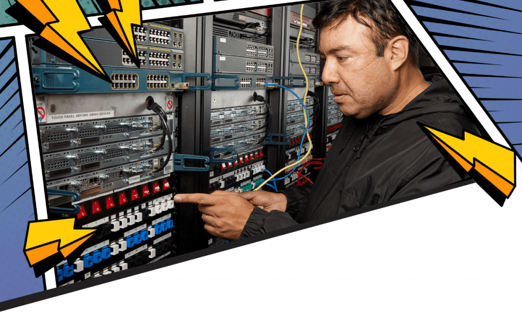 Felix Gimenez works on a server on Clark’s campus.