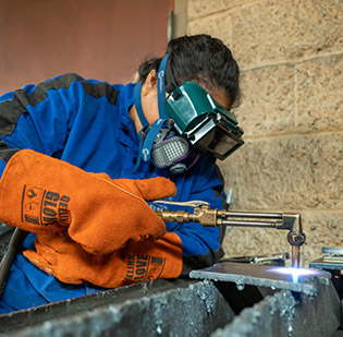 Abigael Rubio-Esteban welding student