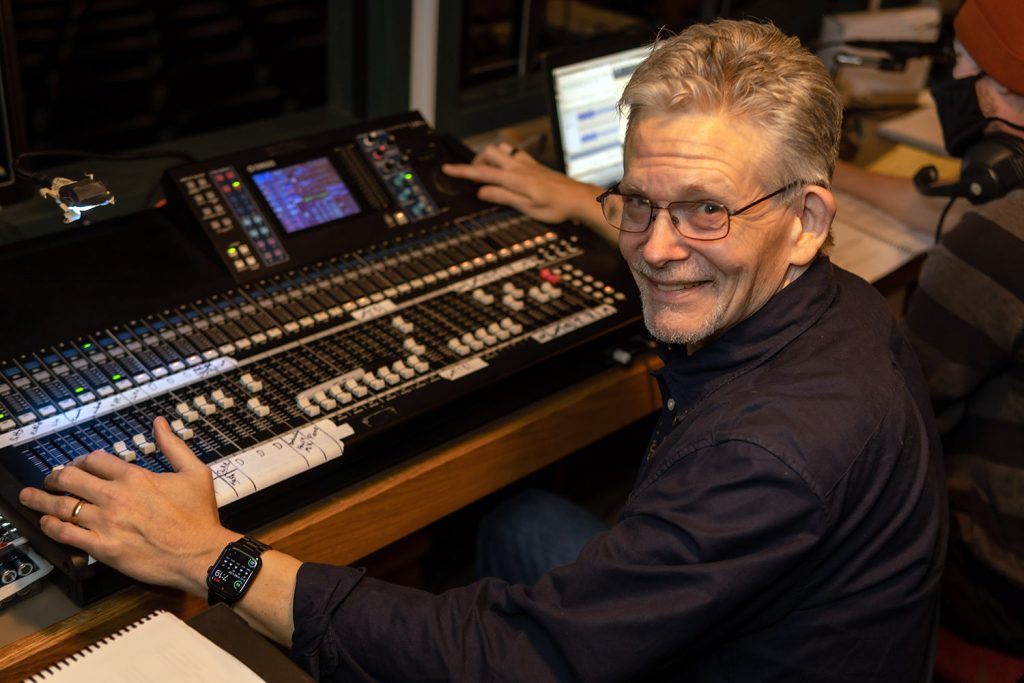 Mark Owsley ’79, Clark’s stage manager for 35 years, working the soundboard for “The Great American Trailer Park Musical.”